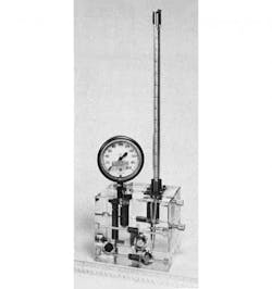 Figure 2. Air can exist in a fluid in compressible (entrained and free air) and incompressible (dissolved air) forms. Therefore, it is necessary to have two distinctly different means of measuring its presence. The device in Figure 2 measures compressible air content. The air in a closed system is pressurized to a predetermined level, either with its own fluid or from an external supply. After “zeroing-out” the instrument, pressure is relieved and the compressed fluid is allowed to expand into a manometer tube, where it is measured. The amount of trapped air can be measured with Boyle’s law. Figure 2. Air can exist in a fluid in compressible (entrained and free air) and incompressible (dissolved air) forms. Therefore, it is necessary to have two distinctly different means of measuring its presence. The device in Figure 2 measures compressible air content. The air in a closed system is pressurized to a predetermined level, either with its own fluid or from an external supply. After “zeroing-out” the instrument, pressure is relieved and the compressed fluid is allowed to expand into a manometer tube, where it is measured. The amount of trapped air can be measured with Boyle’s law.