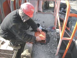 Action to reduce contamination of a Hitachi EX2500 excavator involved installing gaskets where none had been provided. . Action to reduce contamination of a Hitachi EX2500 excavator involved installing gaskets where none had been provided. .