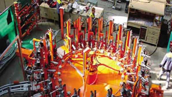 This circular production station relies on safe and reliable pneumatics for precise positioning in refilling LP cylinders of varying sizes shapes and configurations