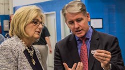 DesCase President and CEO Brian Gleason explains to US Tennessee State Representative Diane Black how a DesCaseproduced visual oil analysis can be glassmounted onto the side of equipment to help technicians monitor lubricant quality DesCase President and CEO Brian Gleason explains to US Tennessee State Representative Diane Black how a DesCaseproduced visual oil analysis can be glassmounted onto the side of equipment to help technicians monitor lubricant quality