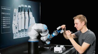The BionicCobot emulates movements of a human arm and acheives gentle movements to operate safely with human workers. (Courtesy of Festo)