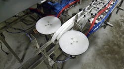 This bottling machine makes use of ac and dc motor drives and extensive pneumatic cylinders and valves for operation, all controlled by a DLC programmable logic controller. This bottling machine makes use of ac and dc motor drives and extensive pneumatic cylinders and valves for operation, all controlled by a DLC programmable logic controller.