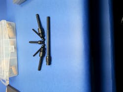 Several rivet-style plugs. Several rivet-style plugs.