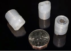 Monolithic, fully 3D-printed magnetic pumps have ports (visible in the pumps on the left and center) and an embedded magnet (visible in the pump on the right). Monolithic, fully 3D-printed magnetic pumps have ports (visible in the pumps on the left and center) and an embedded magnet (visible in the pump on the right).