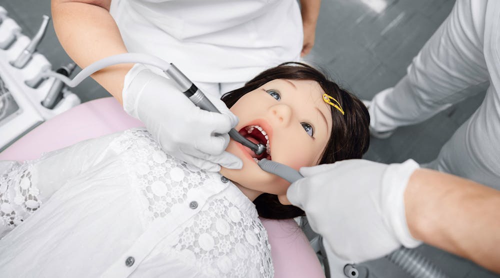 Pneumatic Robot Tyke Visits the Dentist | Power & Motion