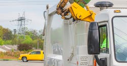 Robotic arm dumps trash Robotic arm dumps trash