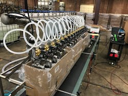 The flexibility and adaptability of the automated solution helped RHMC quickly develop multiple filler automation machines and add improvements as needed. In this case, RHMC revised the equipment to fill groups of already-cased pails, instead of filling individual pails. The flexibility and adaptability of the automated solution helped RHMC quickly develop multiple filler automation machines and add improvements as needed. In this case, RHMC revised the equipment to fill groups of already-cased pails, instead of filling individual pails.