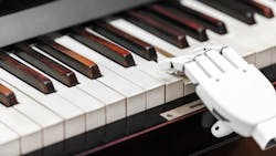 Robot playing a piano Robot playing a piano