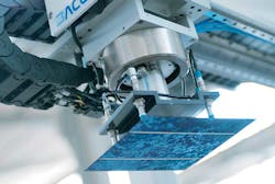 Suction-cup grippers hold a solar wafer as its moved from one manufacturing process to another. Suction-cup grippers hold a solar wafer as its moved from one manufacturing process to another.