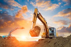 Excavator in construction site Excavator in construction site