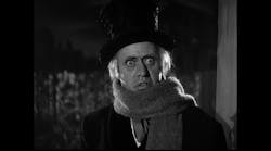 Alastair Sim as Ebenezer Scrooge