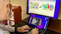 Tom Gill at work Tom Gill at work