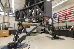 The Gen3 motion base underpins a simulated load. The Gen3 motion base underpins a simulated load.