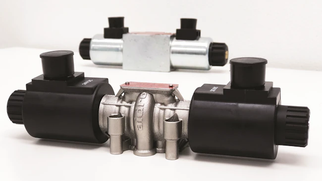 A comparison of the design changes possible with 3D printing. The valve in the foreground is 3D printed while the one in the background is manufactured using traditional methods.