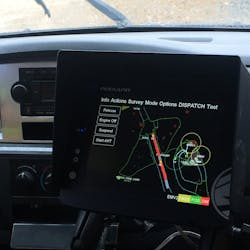 A display within the cab of a Komatsu AHS-equipped truck shows the path the machine will take and objects in the nearby area. A display within the cab of a Komatsu AHS-equipped truck shows the path the machine will take and objects in the nearby area.