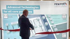 Christoph Kleu, Executive Vice President and CFO at Bosch Rexroth cuts the ribbon to inaugurate the company&rsquo;s new factory automation Customer Innovation Center.