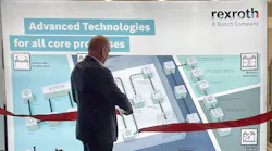 Christoph Kleu, Executive Vice President and CFO at Bosch Rexroth cuts the ribbon to inaugurate the company’s new factory automation Customer Innovation Center.