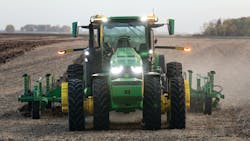John Deere's 8R tractor can be operated with or without a person in the cab. John Deere's 8R tractor can be operated with or without a person in the cab.