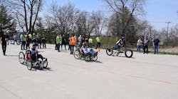 University students race their vehicle designs created using fluid power technologies as part of the Fluid Power Vehicle Challenge.