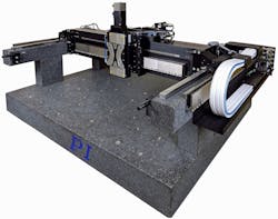 Figure 5: A compact, hybrid air bearing/mechanical bearing gantry XYZ system. Air bearings are utilized for the cross axis because it is used for high speed scanning. For the slower axes, mechanical bearings are sufficient. Figure 5: A compact, hybrid air bearing/mechanical bearing gantry XYZ system. Air bearings are utilized for the cross axis because it is used for high speed scanning. For the slower axes, mechanical bearings are sufficient.