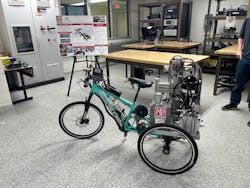 A team of three MSOE underclassmen designed and built a bicycle-based vehicle incorporating hydraulics, pneumatics and electronics as part of the NFPA Fluid Power Vehicle Challenge.