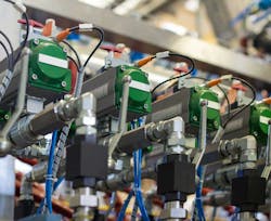 The pairing of electronics with hydraulics and other motion devices is bringing new levels of control and efficiency. The pairing of electronics with hydraulics and other motion devices is bringing new levels of control and efficiency.