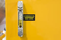 Monitoring oil levels in hydraulic reservoirs ensures there will be enough to continue operating machinery. Monitoring oil levels in hydraulic reservoirs ensures there will be enough to continue operating machinery.