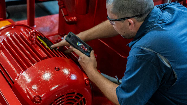 Figure 1: Cell phones are a convenient and popular way for an on-site technician to obtain step-by-step instructions from the remote person and to communicate results. Image courtesy of Motion Industries Inc.