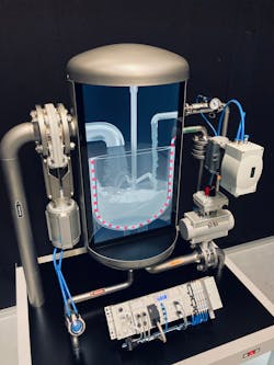 A Festo controller and automated process valves simulate the automated extraction process of precious materials from a slurry of shredded EV batteries. A Festo controller and automated process valves simulate the automated extraction process of precious materials from a slurry of shredded EV batteries.
