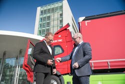 Torben Christensen, Chief Sustainability Officer and Head of Global Services at Danfoss (left) receives the keys for the first Volvo electric trucks Danfoss will use at its sites in Denmark from Peter Ericson, Managing Director of Volvo Denmark.