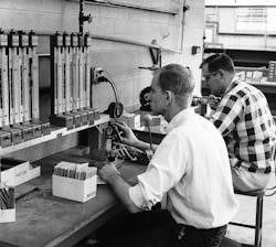 A testing station at The Lee Company in the 1960s where engineers worked to ensure the company's products would perform as desired in customers' fluid power systems. A testing station at The Lee Company in the 1960s where engineers worked to ensure the company's products would perform as desired in customers' fluid power systems.