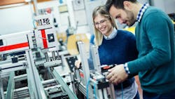 Engineers collaborating on design project Engineers collaborating on design project