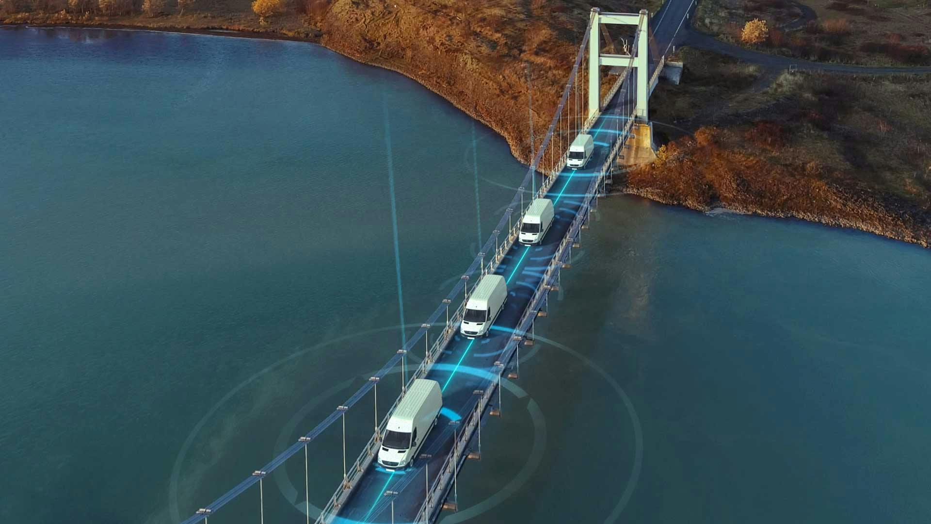 a depiction of connected autonomous vehicles on roadway