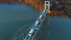 a depiction of connected autonomous vehicles on roadway a depiction of connected autonomous vehicles on roadway