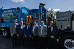 Mack Trucks executives handed over the Mack LR Electric battery-electric refuse vehicle to customer Coastal Waste &amp; Recycling. Pictured left to right is Darren Jane, Mack senior district manager &ndash; Southeast; Jonathan Randall, president of Mack Trucks North America; Brendon Pantano, CEO of Coastal Waste &amp; Recycling; Tyler Ohlmansiek, Mack director of e-mobility sales; Dennis McDaniel, Mack Regional Vice President &ndash; Southeast; and Ryan Saba, Mack e-mobility energy solutions manager.