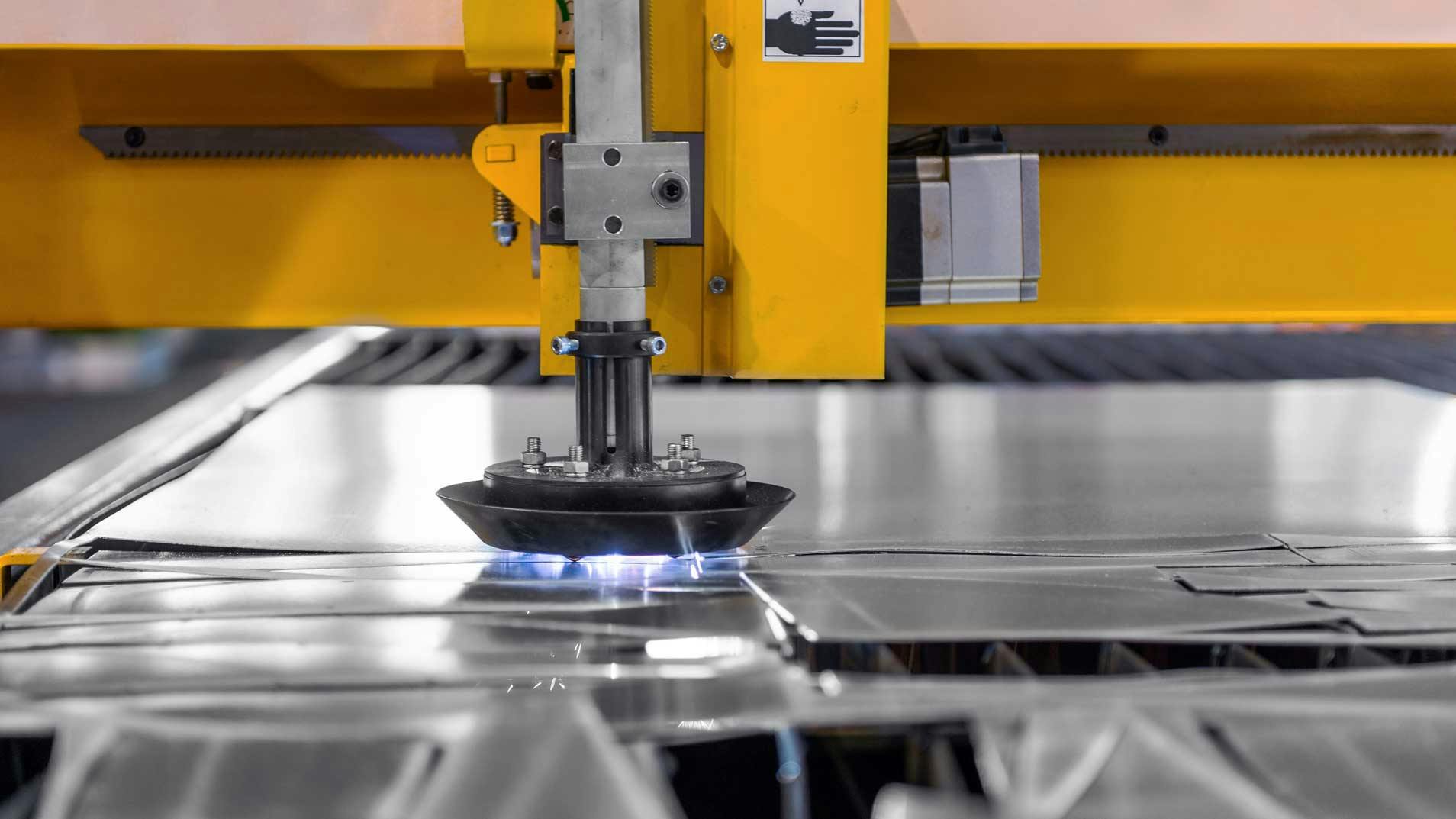 closeup of steel cutting machinery