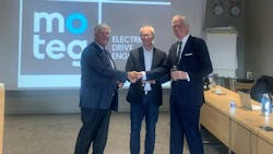 Executives from Poclain and MOTEG celebrate the acquisition of the latter which will help to further expand the electromobility solutions offered by Poclain.