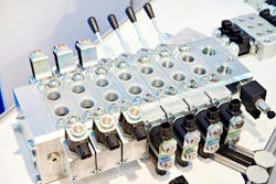 A bank of proportional hydraulic valves. A bank of proportional hydraulic valves.