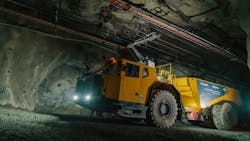 Epiroc's Minetruck MT42 SG Trolley driving up the ramp in an underground mine. Epiroc's Minetruck MT42 SG Trolley driving up the ramp in an underground mine.