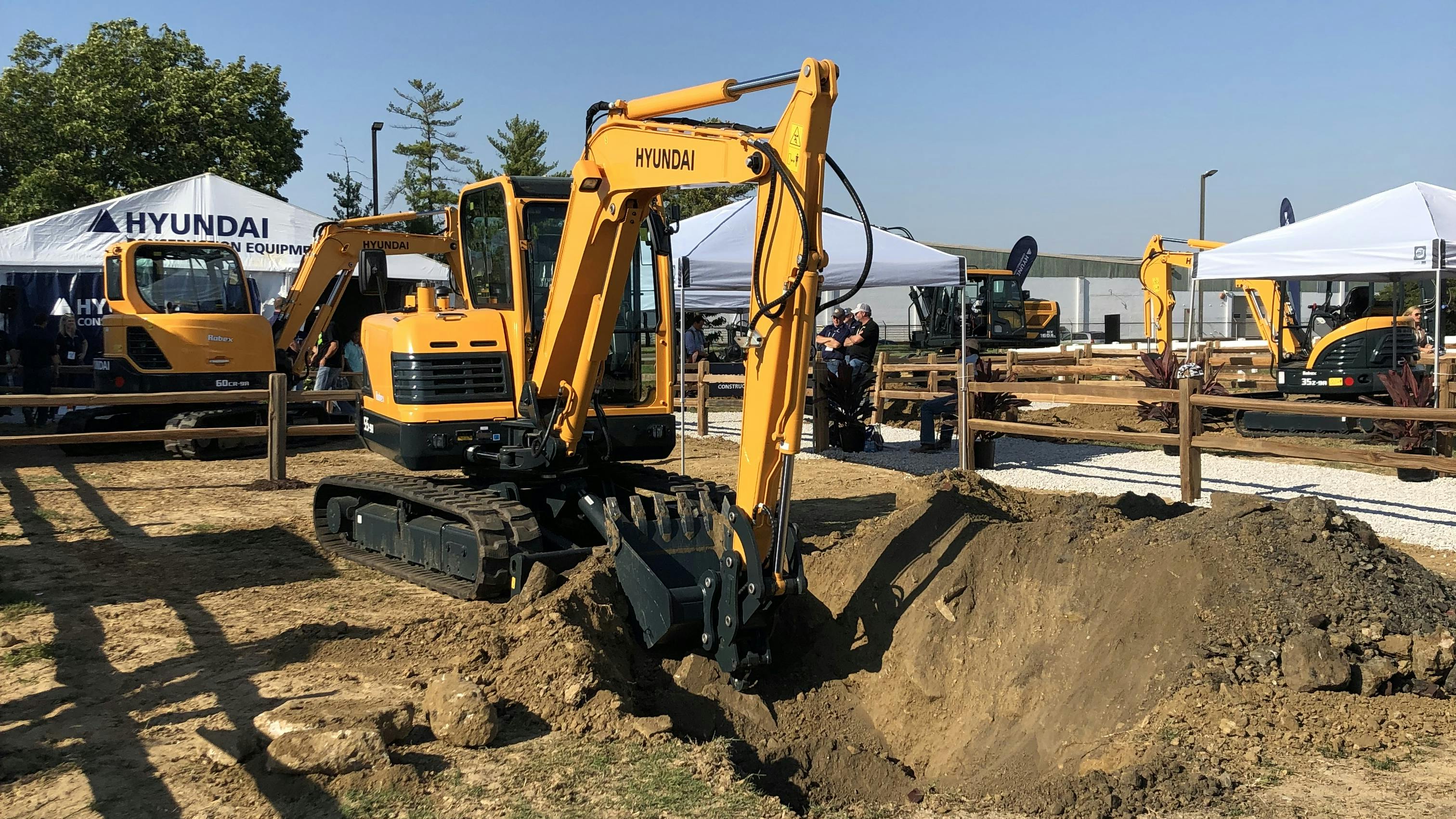 An excavator digging dirt