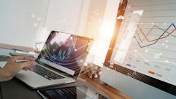 A concept image showing economic graphs and a business report A concept image showing economic graphs and a business report