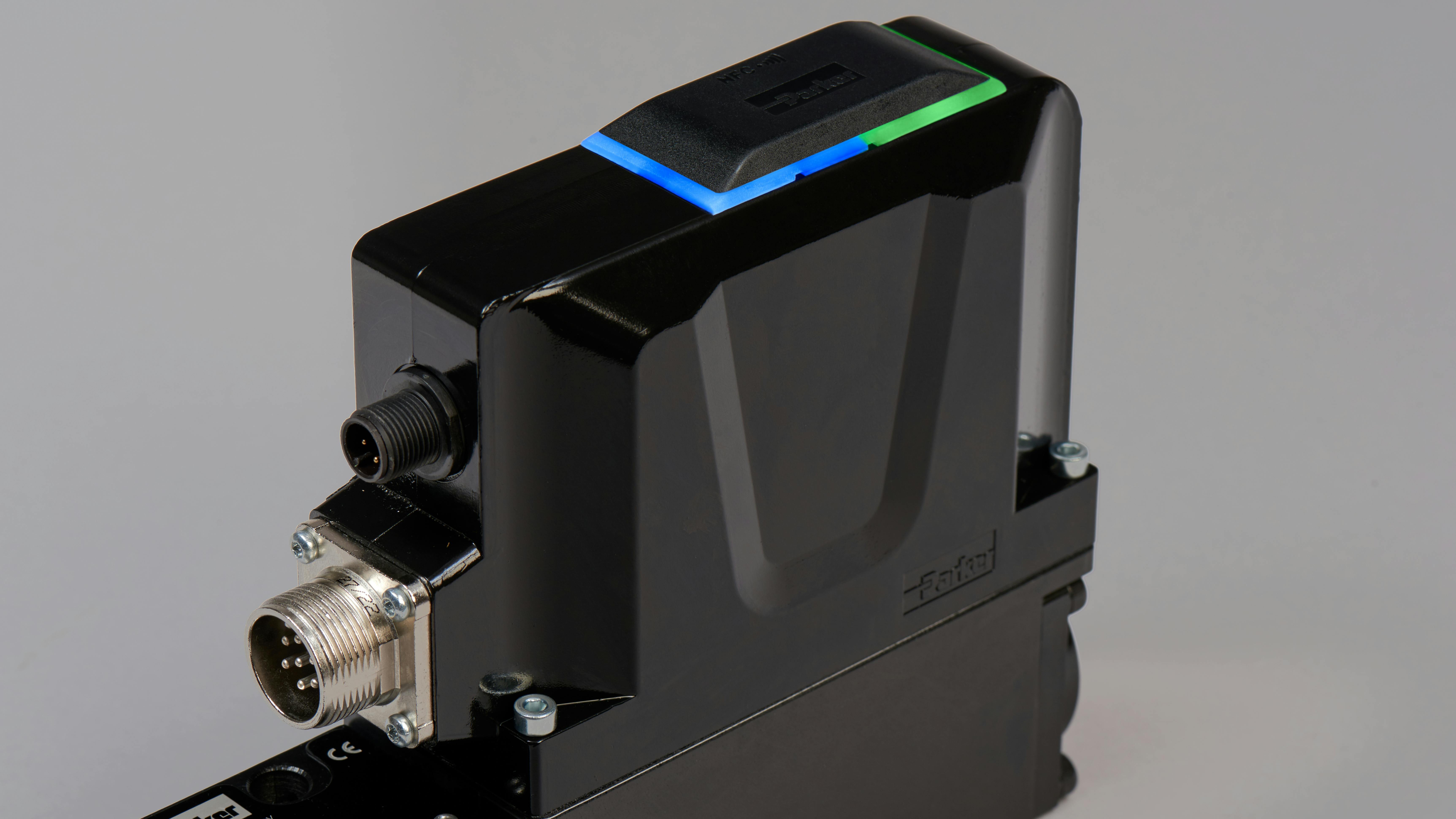 A closeup of an LED display on a Parker Hannifin hydraulic valve provides status information