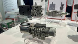 A 3D printed hydraulic component on display at a tradeshow demonstrates advancements in fluid power designs A 3D printed hydraulic component on display at a tradeshow demonstrates advancements in fluid power designs