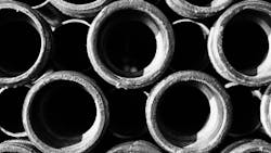 A close up view of several black iron pipes A close up view of several black iron pipes