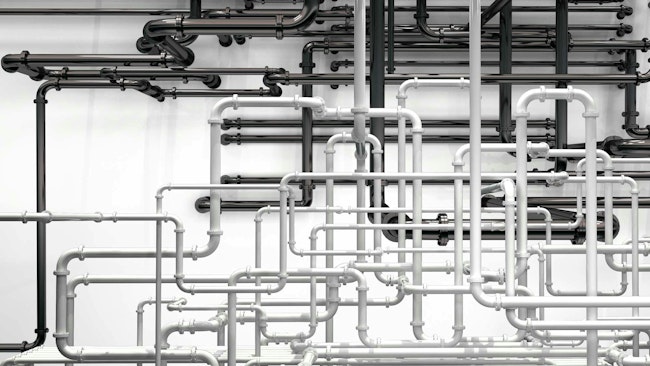 Pipes going in various directions to deliver compressed air to pneumatic systems