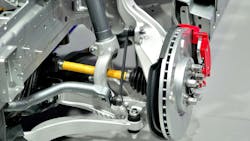 A close up view of a brake on a vehicle suspension A close up view of a brake on a vehicle suspension