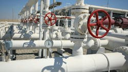 A close up image of oil and gas processing plant pipe lines and valves A close up image of oil and gas processing plant pipe lines and valves