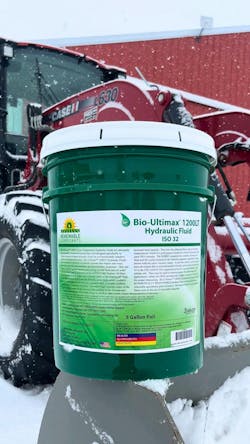 An image of a container of Bio-Ultimax 1200LT Hydraulic Fluid in front of a snow covered tractor An image of a container of Bio-Ultimax 1200LT Hydraulic Fluid in front of a snow covered tractor
