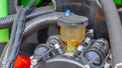 A close up image of a hydraulic fluid tank on a piece of mobile machinery A close up image of a hydraulic fluid tank on a piece of mobile machinery