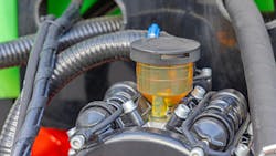 A close up image of a hydraulic fluid tank on a piece of mobile machinery A close up image of a hydraulic fluid tank on a piece of mobile machinery